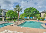 Thumbnail 6 of 10 - Sparkling Pool with Sundeck at Logans Mill, Austin, Texas.