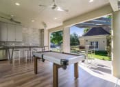 Thumbnail 2 of 14 - Outdoor Entertaining Space with Pool Table. at Franciscan of Arlington, Texas, 76015