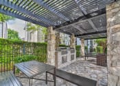 Thumbnail 7 of 10 - Outdoor Summer Kitchen with Two Grilling Stations.at Logans Mill, Austin, TX.