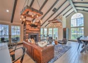 Thumbnail 2 of 10 - Resident Lounge with Media and Coffee Station at Logans Mill, Austin, TX.