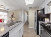 Thumbnail 10 of 12 - Kitchen at Sutton Place, Texas
