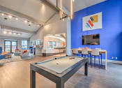 Thumbnail 3 of 12 - Resident Lounge with Pool Table at Sutton Place, Dallas, TX