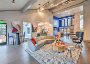 Thumbnail 1 of 12 - Resident Lounge with Media and Coffee Station at Sutton Place, Dallas