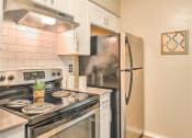 Thumbnail 8 of 12 - Kitchen at Sutton Place, Texas