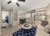 Thumbnail 7 of 12 - Living Room and Dining area at Sutton Place, Dallas, TX, 75287