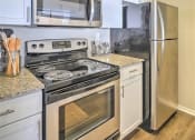 Thumbnail 22 of 34 - Kitchen area at The Atlantic Mansfield, Mansfield, TX, 76063