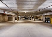 Thumbnail 36 of 43 - the inside of a parking garage with cars in it