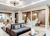 Thumbnail 2 of 43 - a living room with a couch and a table