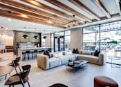 Thumbnail 7 of 43 - 400 Rose Resident Lounge with Fireplace and Seating