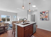 Thumbnail 5 of 15 - Kitchen island at The Landing at Hub City, Plymouth, WI