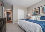 Thumbnail 5 of 30 - Bedroom at Tivoli Green Apartments & Townhomes, Mount Pleasant, Wisconsin