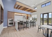 Thumbnail 16 of 30 - Clubhouse Kitchen at Tivoli Green Apartments & Townhomes, Wisconsin, 53406