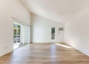 Thumbnail 7 of 13 - living room with sliding glass door
