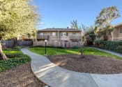 Thumbnail 13 of 13 - exterior of apartments with landscaping
