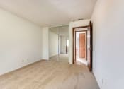 Thumbnail 10 of 13 - bedroom with mirrored closet doors