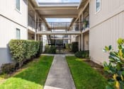 Thumbnail 18 of 20 - apartment stairways and grass