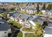 Thumbnail 23 of 27 - aerial view of apartments and lawn