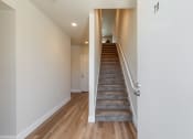 Thumbnail 13 of 30 - 2 bedroom entry view of stairs to upper floor