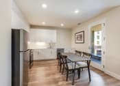 Thumbnail 11 of 30 - 2 bedroom - kitchen with dining area and view of balcony door