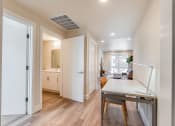 Thumbnail 3 of 30 - 2 bd study nook with view of bathroom and bedroom entry