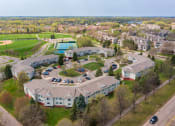Thumbnail 1 of 30 - aerial view of lakeview commons apartment complex with views of nearby athletic fields