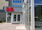 Thumbnail 3 of 3 - a building with a sign that reads 868 at the front of it