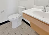 Thumbnail 19 of 46 - Another toilet and vanity at Stryker Senior Apartments in West St. Paul 