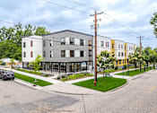 Thumbnail 1 of 46 - a street view of a row of Stryker Senior Apartments in West St. Paul from the street corner