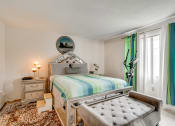 Thumbnail 19 of 30 - bedroom with furniture and carpet