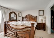 Thumbnail 12 of 30 - bedroom with wooden furniture