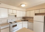 Thumbnail 7 of 30 - kitchen with white fridge, corner sink, white electric range,