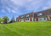 Thumbnail 8 of 29 - A photo of the front lawn of  Liberty Plaza Townhomes