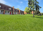 Thumbnail 5 of 29 - A photo of the front lawn of Liberty Plaza Townhomes