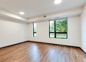 Thumbnail 37 of 46 - another Stryker Senior Apartments in West St. Paul living room with wood floors and a window