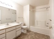 Thumbnail 24 of 30 - main bathroom with sink, toilet, and shower/tub combo