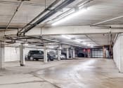 Thumbnail 29 of 30 - underground parking garage with cars