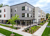 Thumbnail 24 of 46 - a view of a Stryker Senior Apartments in West St. Paul with a sidewalk