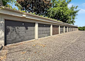 Thumbnail 17 of 20 - A long row of garage doors are closed.