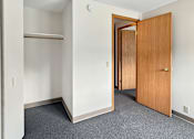 Thumbnail 14 of 29 - A photo of a Liberty Plaza townhome bedroom with a closet