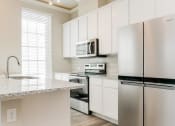Thumbnail 6 of 22 - Efficient Appliances In Kitchen at The Residences at Rayzor Ranch, Denton, TX, 76207