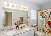 Thumbnail 6 of 10 - Bathroom With Vanity Lights at Georgetown Heights Residents, Georgetown, TX