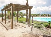 Thumbnail 20 of 40 - a hammock area at the enclave at woodbridge apartments in sugar land, tx