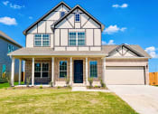 Thumbnail 2 of 22 - Building exterior view with pathway at The Residences at Rayzor Ranch, Texas, 76207