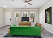 Thumbnail 2 of 15 - Living Room With TV at Mirror Lake Pearland, Texas