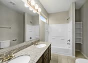 Thumbnail 5 of 19 - Bathroom With Vanity Lights at Bay Colony West, Texas