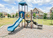 Thumbnail 5 of 15 - a playground with a slide and other toys in a yard with houses in the background