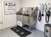 Thumbnail 4 of 27 - A dog wash station with a sign that says "Dog Wash Clean Dogs Happy People".