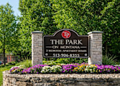Thumbnail 10 of 10 - A sign for The Park on Montana, a 2 bedroom apartment complex, with a phone number listed.