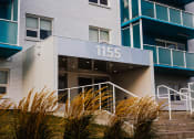 Thumbnail 16 of 21 - the front of a building with the numbers 1155 on it