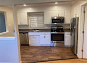 Thumbnail 2 of 7 - Unit Interior - Kitchen